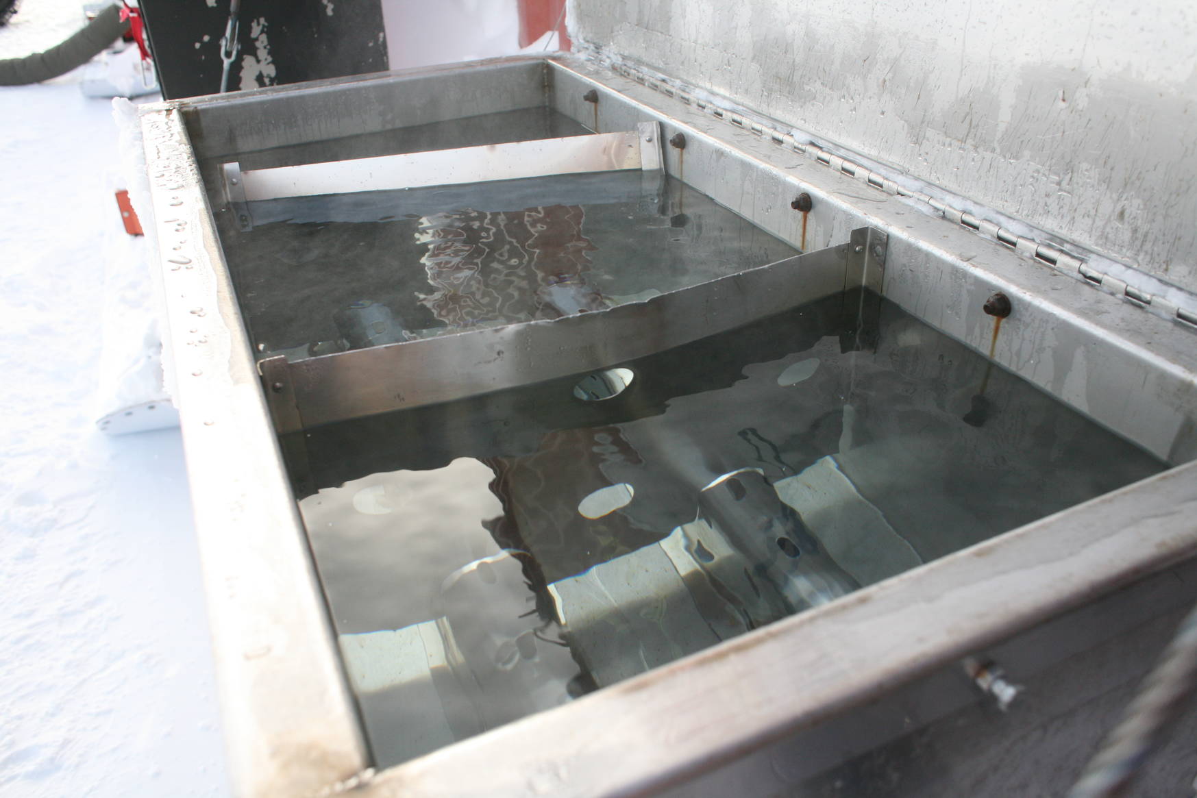 The snow melter, used for obtaining water.