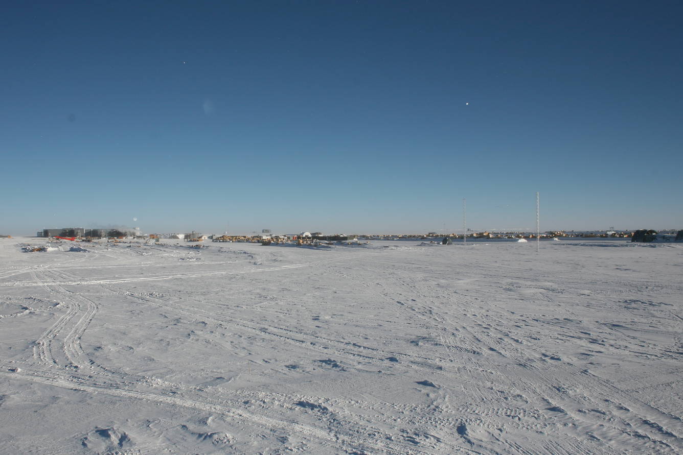 The station and its surroundings seen from the communication radomes. The white spots in the picture are snowflakes.
